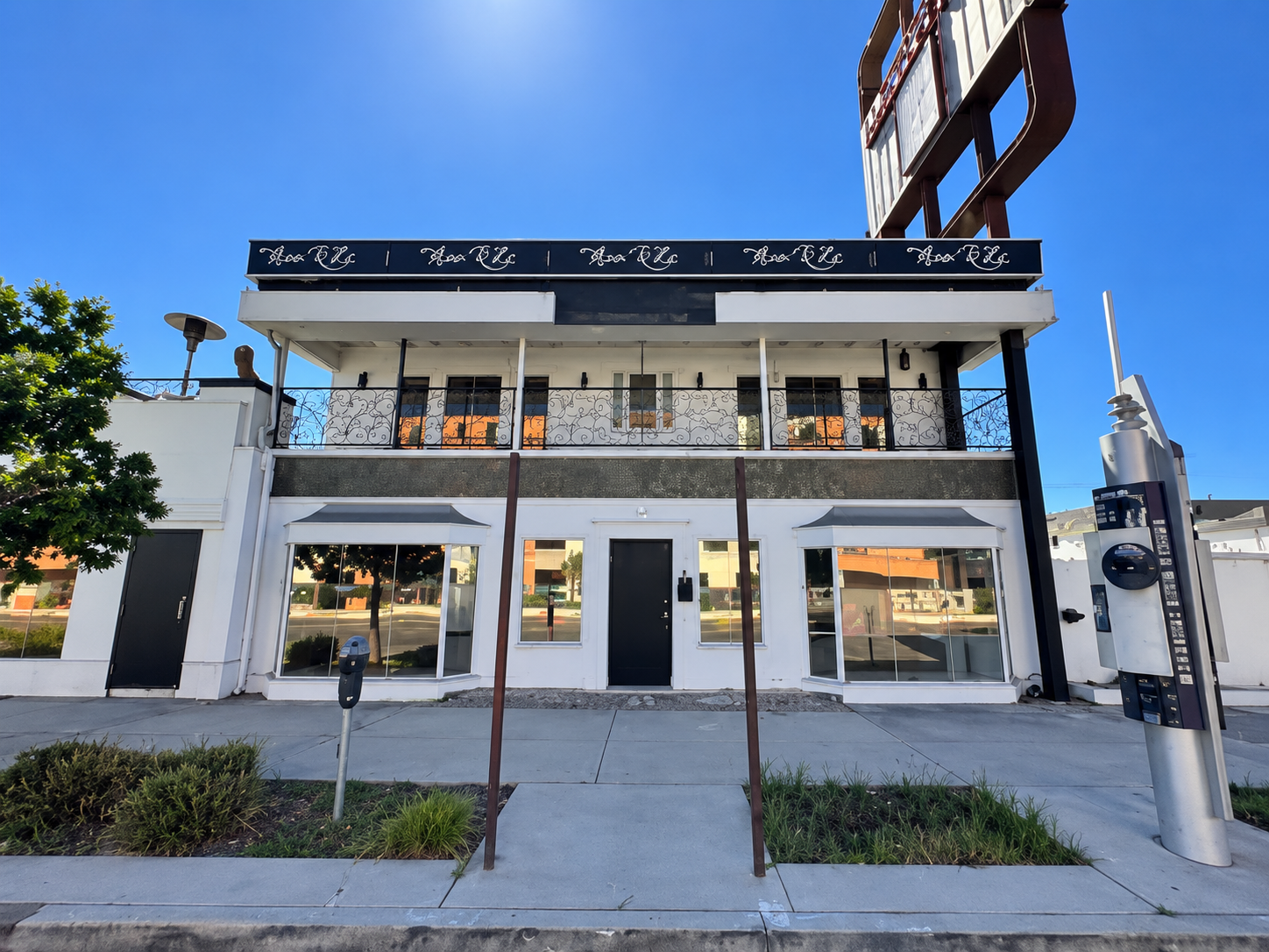 Front entrance and balcony of Mavericks Flat on Crenshaw Boulevard